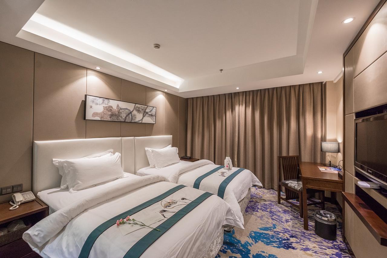Hotel Metropolo Jinjiang Xuzhou Railway Station Suning Plaza Chudu Esterno foto