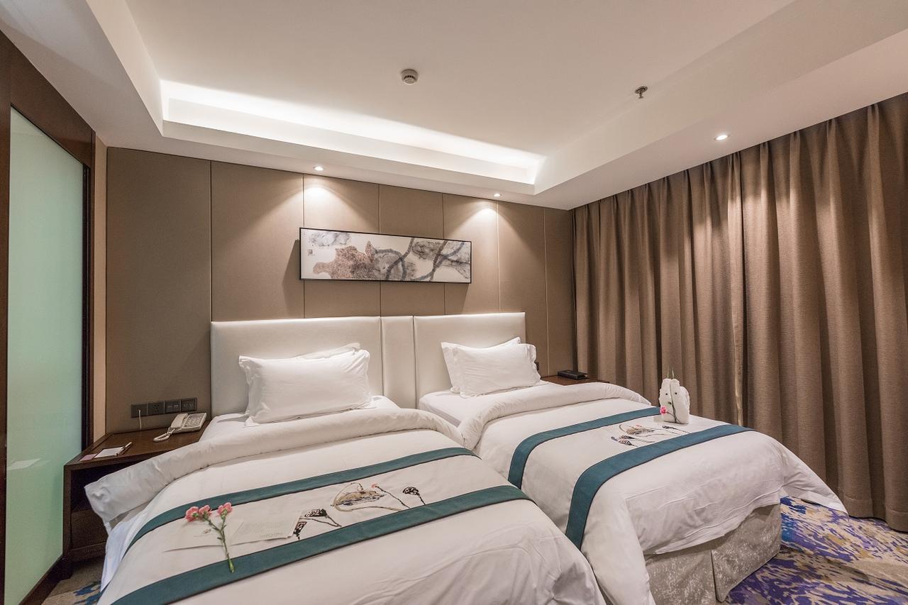 Hotel Metropolo Jinjiang Xuzhou Railway Station Suning Plaza Chudu Esterno foto